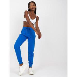 Fashionhunters Základní tmavě modré jogger kalhoty Velikost: M